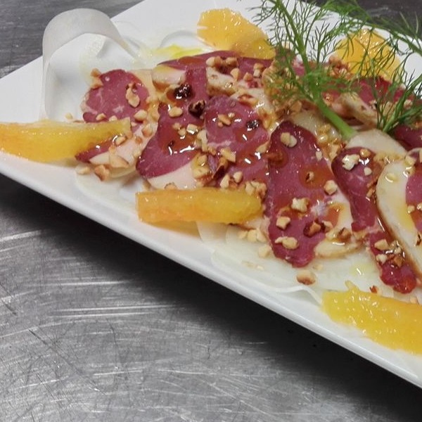 carpaccio di anatra affumicata con arance, finocchi e olio al mandarino